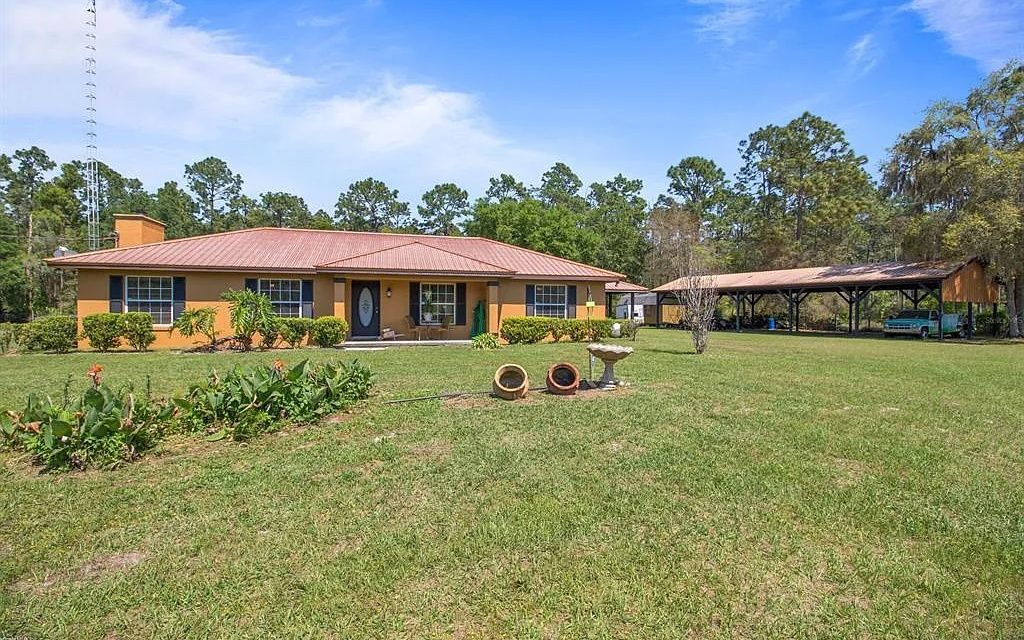Photo of 7751 NE 192nd Pl, Other, FL 32113 (MLS # 129826)