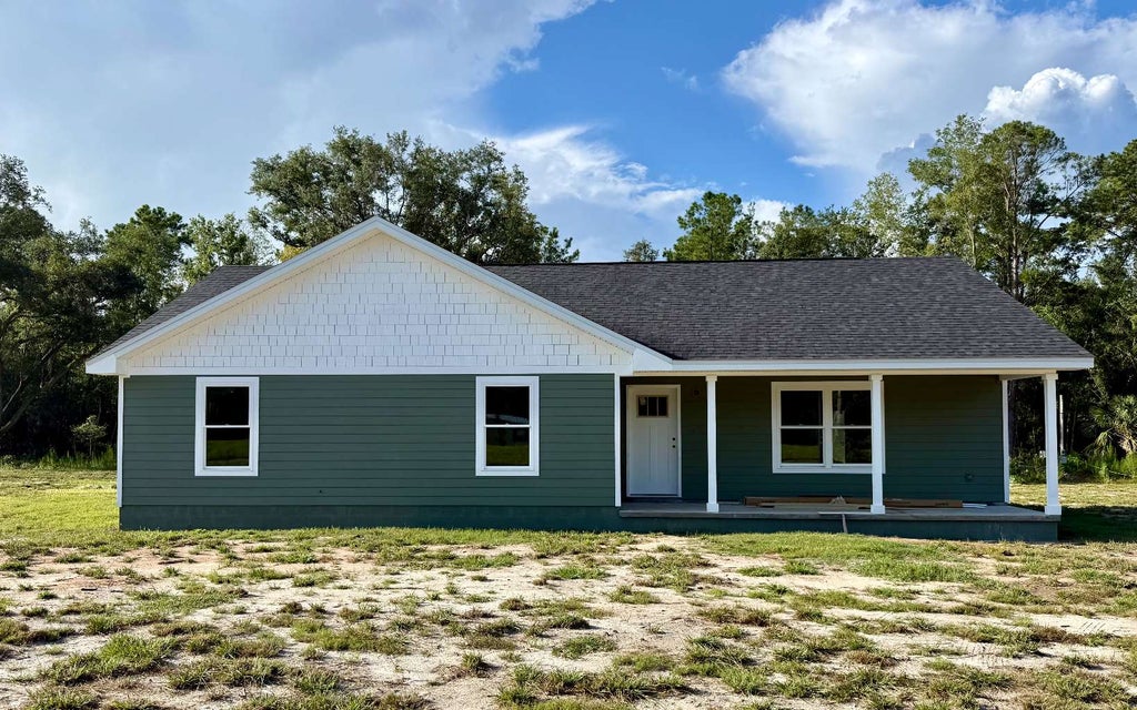 Photo of 8025 Cr 49, Live Oak, FL 32060 (MLS # 132977)