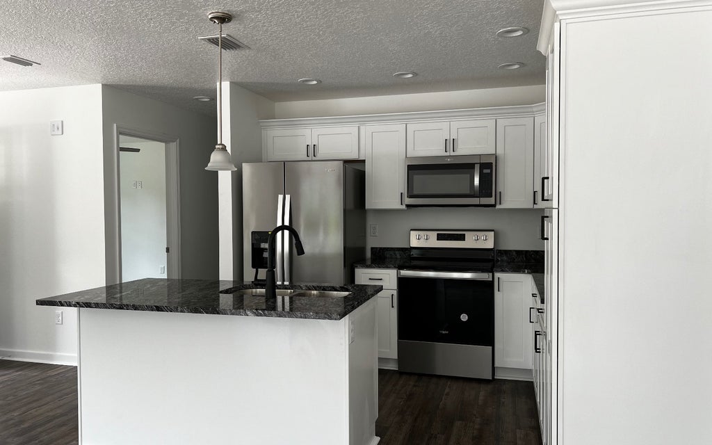 Photo of 8025 Cr 49, Live Oak, FL 32060 (MLS # 132977)