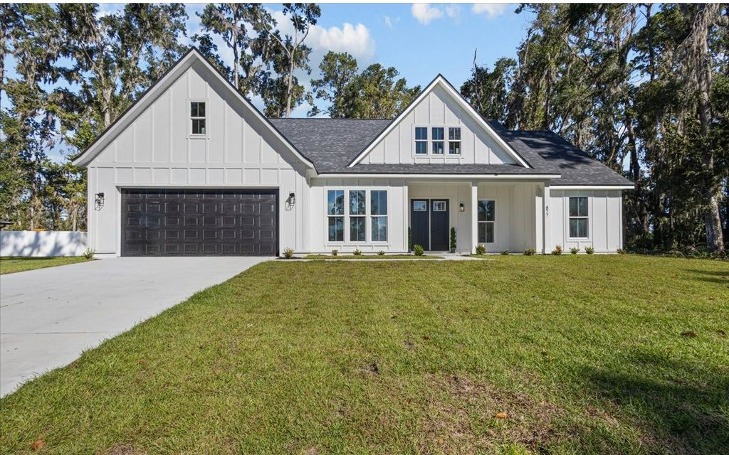 Photo of 877 SE Evergreen Drive, Lake City, FL 32025 (MLS # 128988)