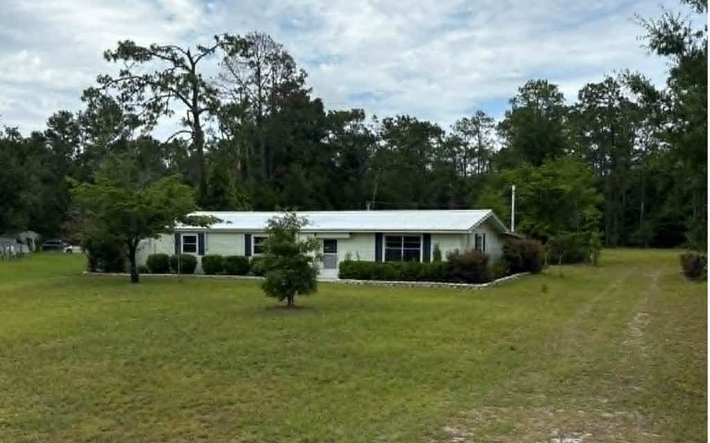 Photo of 4298 River Road, Live Oak, FL 32060 (MLS # 131901)