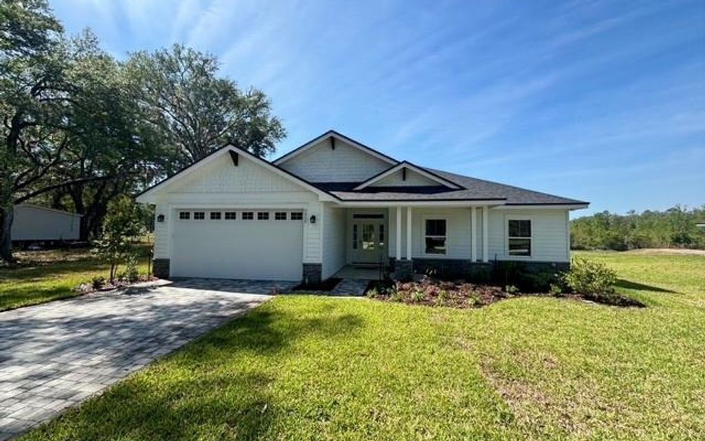 Photo of 5955 SE County Road 21b, Other, FL 32666 (MLS # 129769)