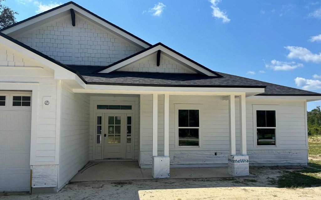 Photo of 5955 SE County Road 21b, Other, FL 32666 (MLS # 129769)