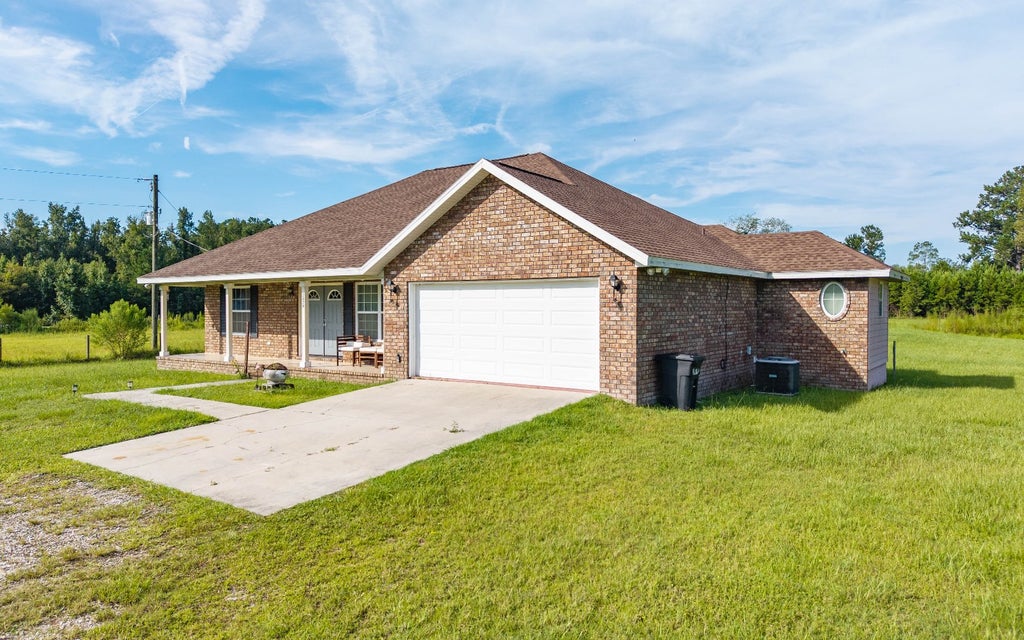 Photo of 7678 NW US-41, Lake City, FL 32055 (MLS # 132720)