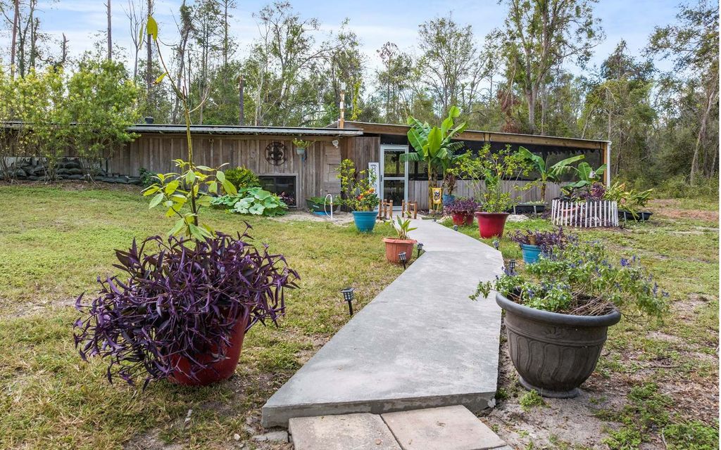 Photo of 365 NW County Road 292, Mayo, FL 32066 (MLS # 127667)