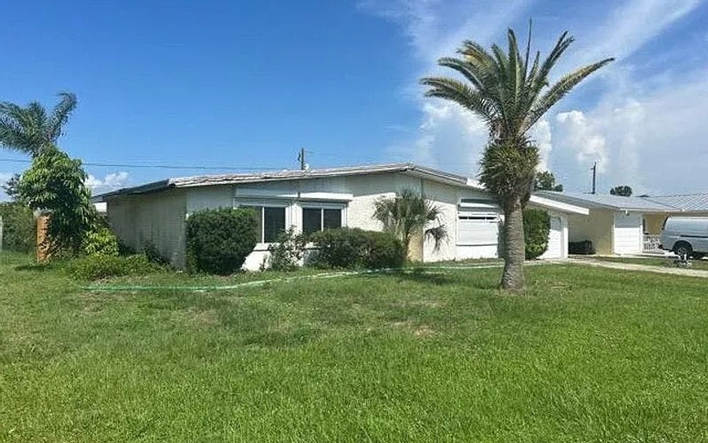 Photo of 322 Sailfish Ln, Other, FL 33982 (MLS # 129550)
