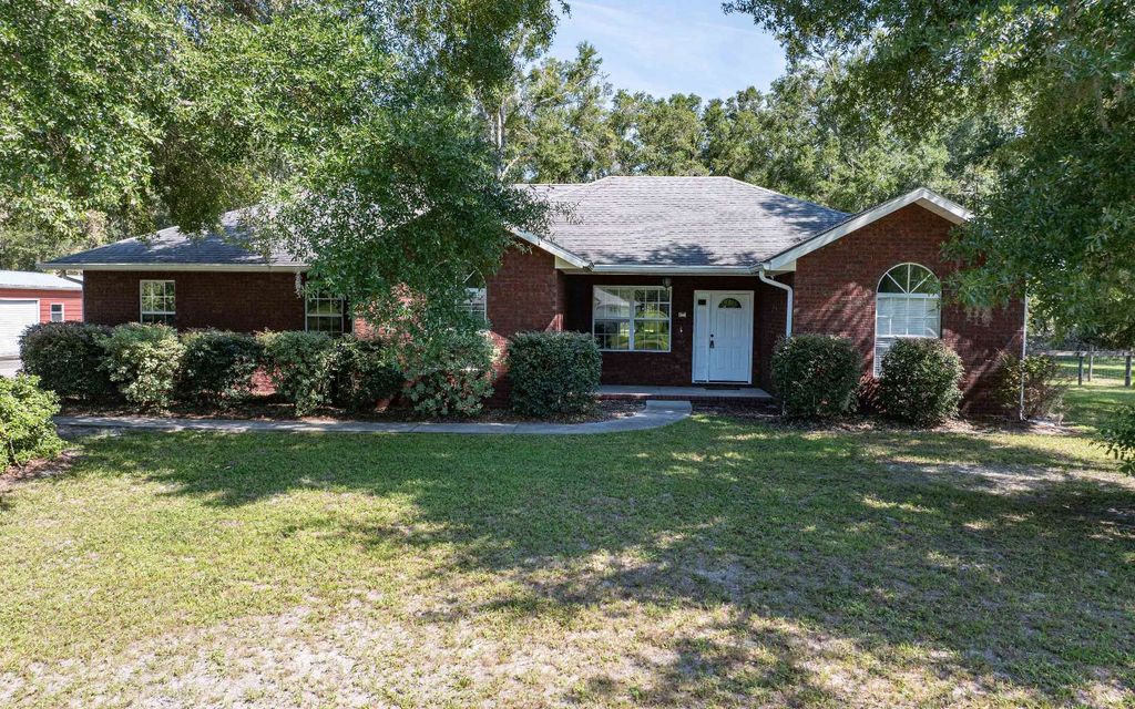 Photo of 341 SW Thistlewood Ln, Fort White, FL 32038 (MLS # 128253)