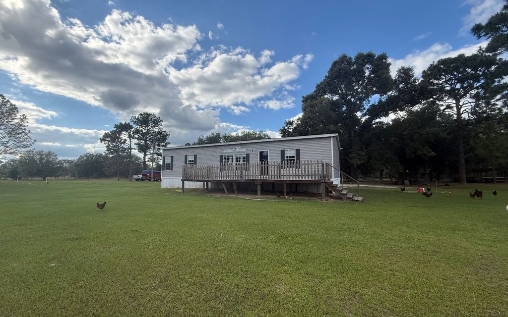 Photo of 10917 S 142nd St, McAlpin, FL 32062 (MLS # 131575)