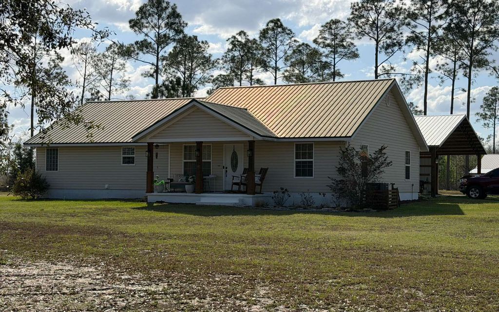 Photo of 270 NW Edward Perry Lane, Mayo, FL 32066 (MLS # 130518)