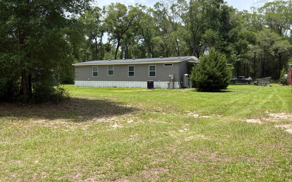 Photo of 139 SW Burgundy Ln, Fort White, FL 32038 (MLS # 131734)