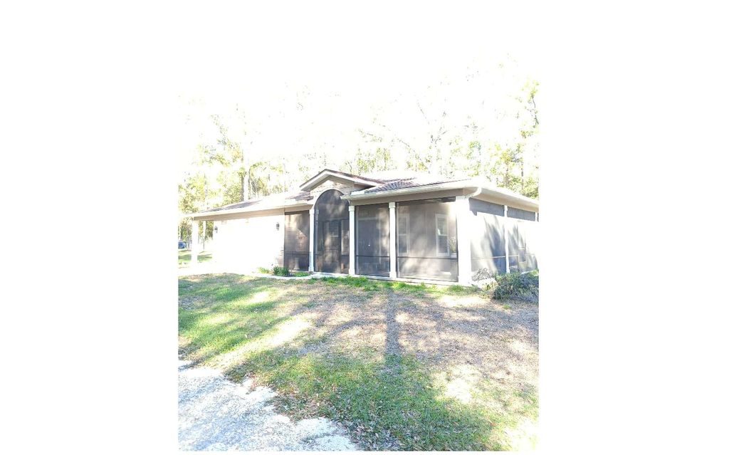 Photo of 21690 119th Drive, OBrien, FL 32071 (MLS # 129889)