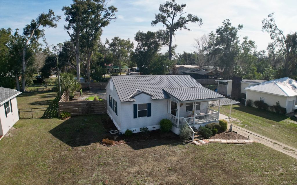 Photo of 1401 White Avenue, Live Oak, FL 32064 (MLS # 129823)