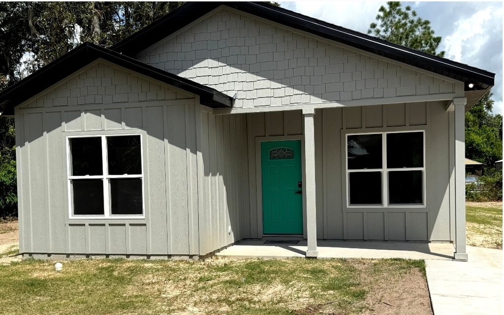 Photo of 823 NE Elsey Place, Lake City, FL 32055 (MLS # 128469)