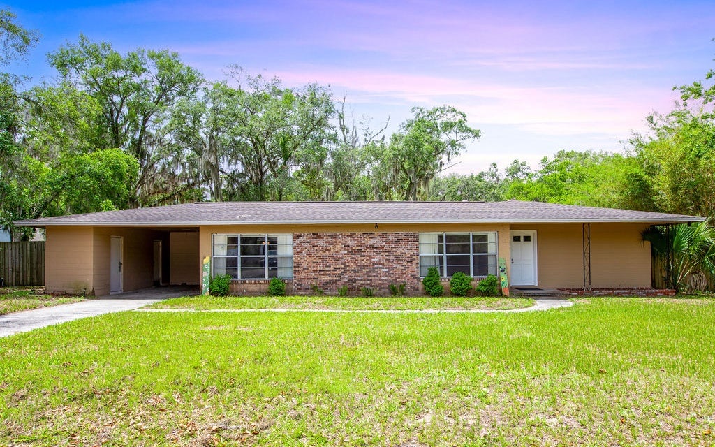 Photo of 1407 NW 21st Ave, Gainesville, FL 32605 (MLS # 133024)