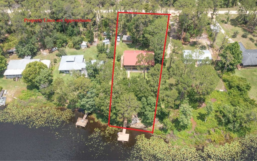 Photo of 303 Riley Lake Drive, Other, FL 32640 (MLS # 131939)