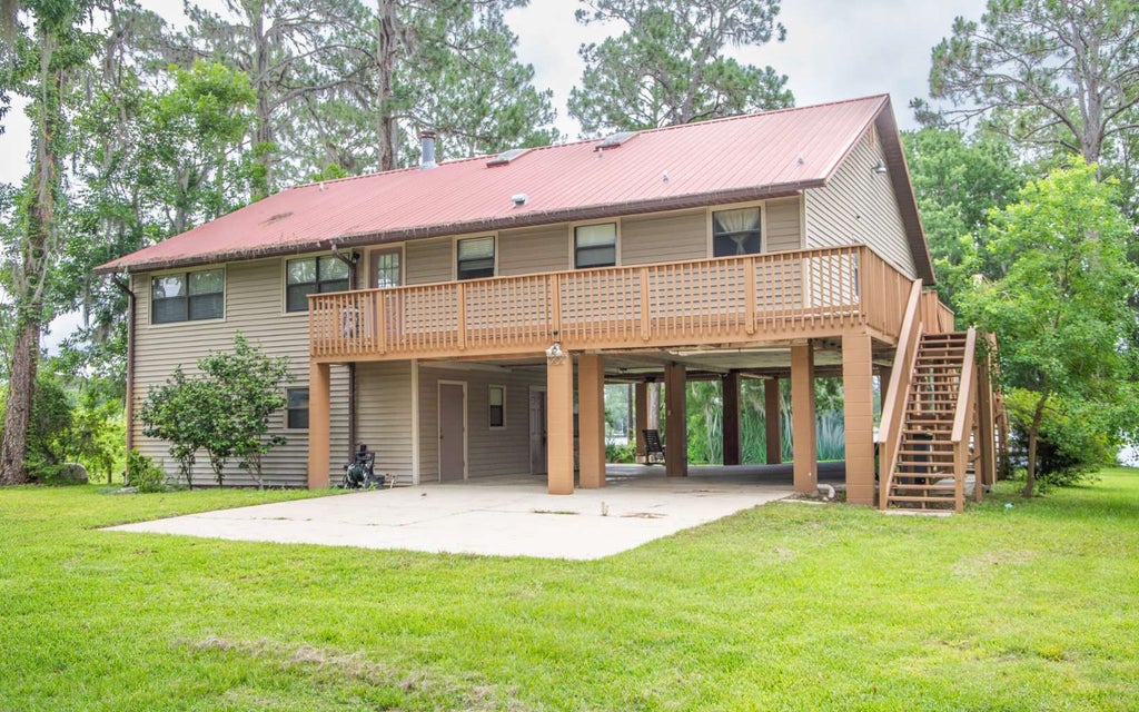Photo of 303 Riley Lake Drive, Other, FL 32640 (MLS # 131939)
