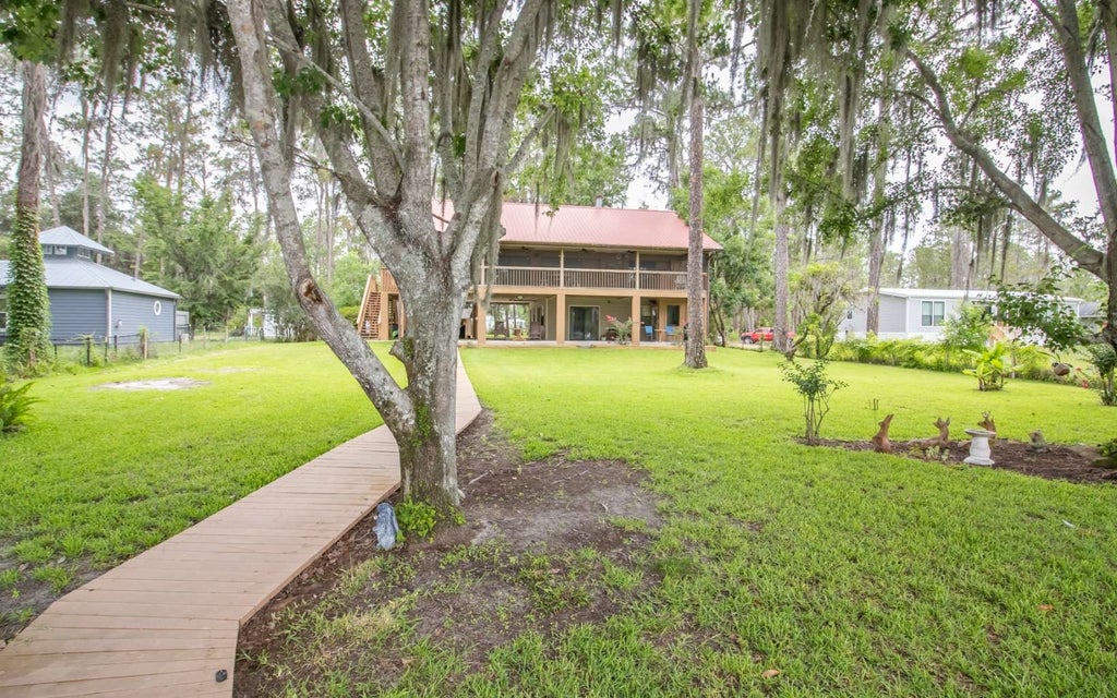 Photo of 303 Riley Lake Drive, Other, FL 32640 (MLS # 131939)