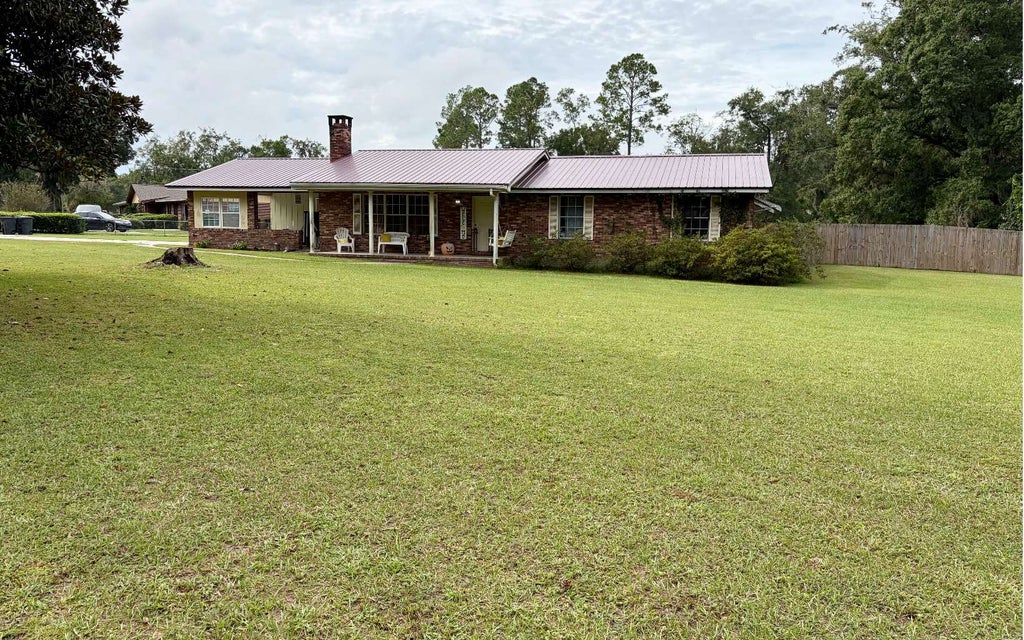 Photo of 2998 SE Country Club Rd, Lake City, FL 32025 (MLS # 133508)