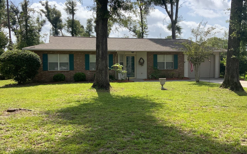 Photo of 10468 Wildwood Dr, Dowling Park, FL 32060 (MLS # 132687)