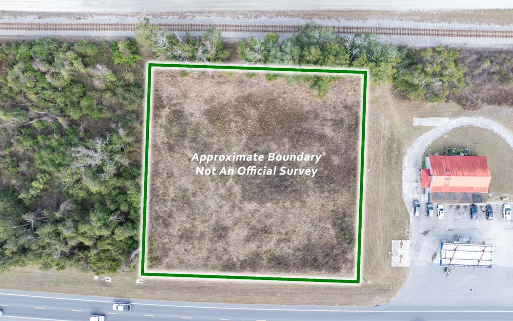 Photo of TBD US Hwy 90 - 1.14 Ac, Live Oak, FL 32060 (MLS # 129728)