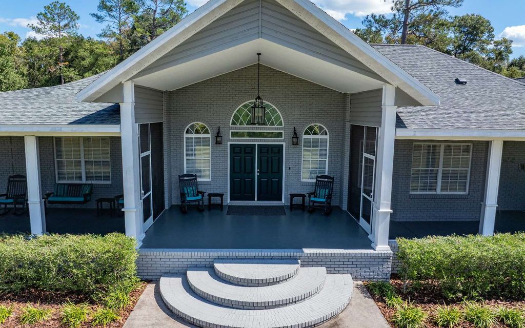 Photo of 1237 SW Old Lake City Ter, High Springs, FL 32643 (MLS # 128893)