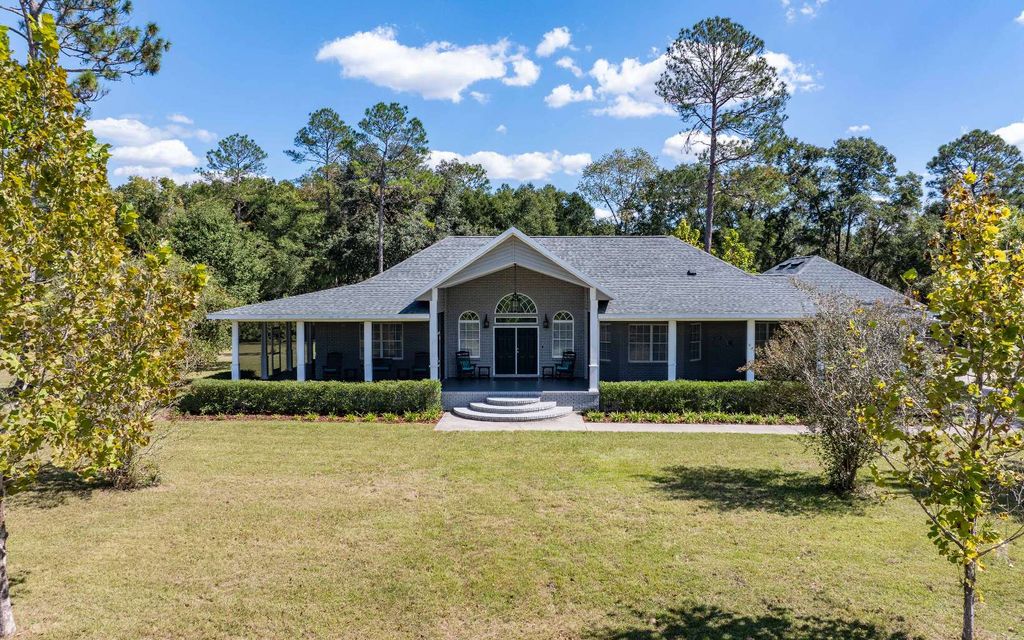 Photo of 1237 SW Old Lake City Ter, High Springs, FL 32643 (MLS # 128893)