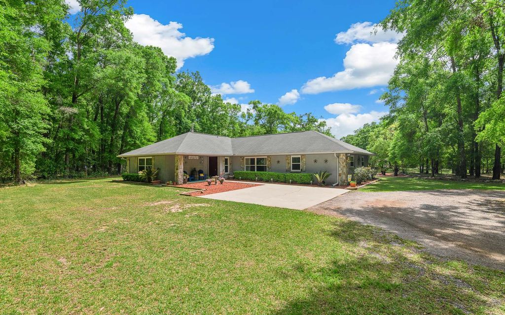 Photo of 23719 NW 142nd Ave, High Springs, FL 32643 (MLS # 129015)