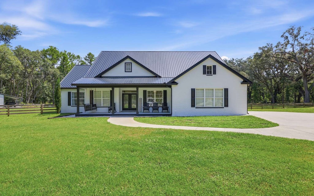 Photo of 767 NW Bridgewater Terrace, Lake City, FL 32055 (MLS # 133060)