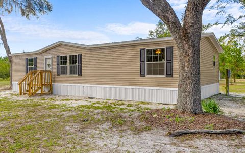 Photo of 419 NW Ivy Gln, Lake City, FL 32055 (MLS # 128950)