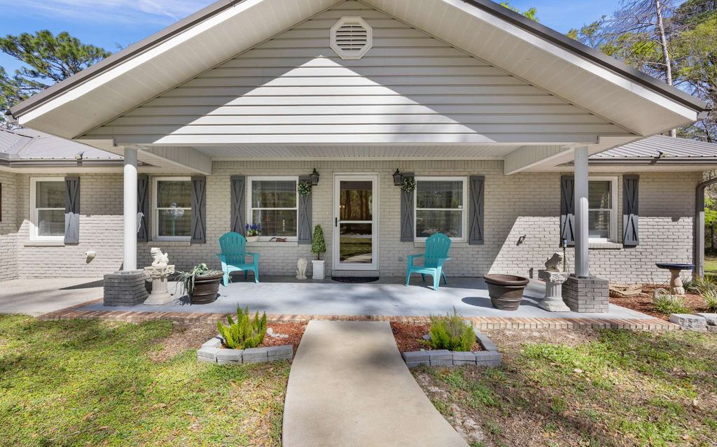 Photo of 423 NW Slappy Drive, Lake City, FL 32055 (MLS # 127941)