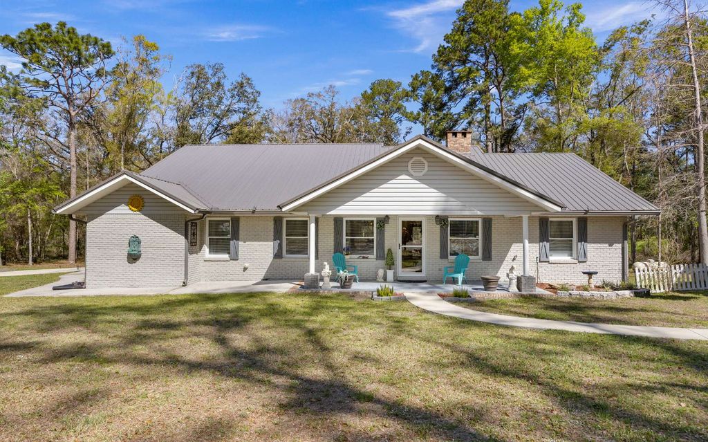 Photo of 423 NW Slappy Drive, Lake City, FL 32055 (MLS # 127941)