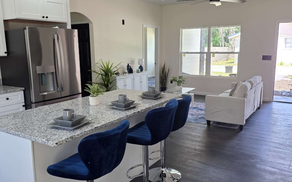Photo of 718 NW Dixie Ave, Lake City, FL 32055 (MLS # 132002)