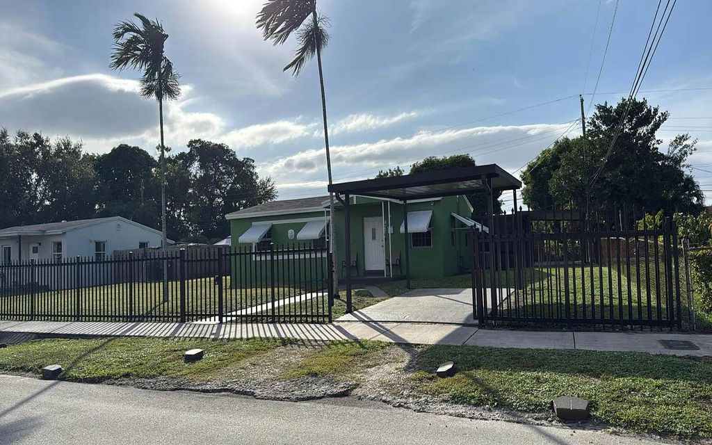 Photo of 16400 NW 18th Ct, Other, FL 33054 (MLS # 129813)