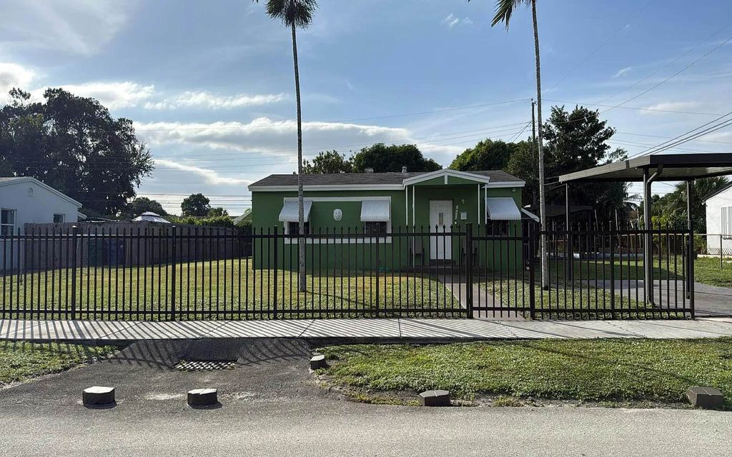 Photo of 16400 NW 18th Ct, Other, FL 33054 (MLS # 129813)