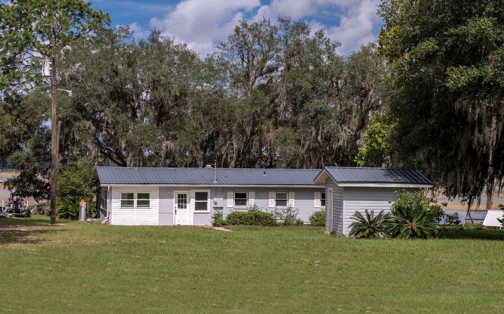 Photo of 5557 County Road 352, Keystone Heights, FL 32656 (MLS # 128583)