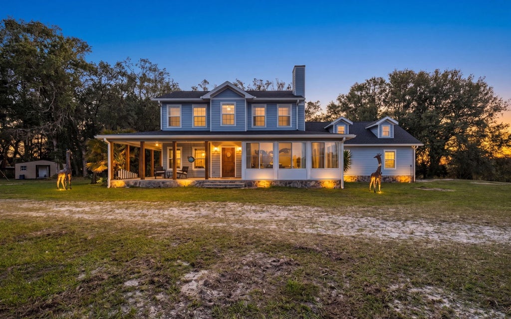 Photo of 17883 89th Rd, McAlpin, FL (MLS # 131385)