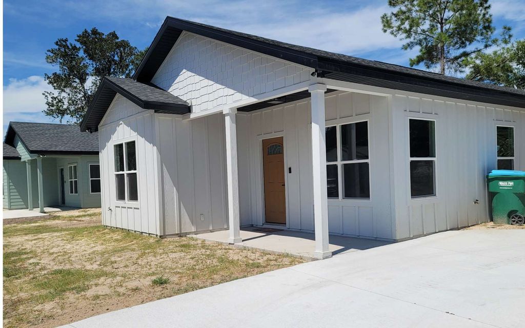Photo of 847 NE Elsey Place, Lake City, FL 32055 (MLS # 128471)
