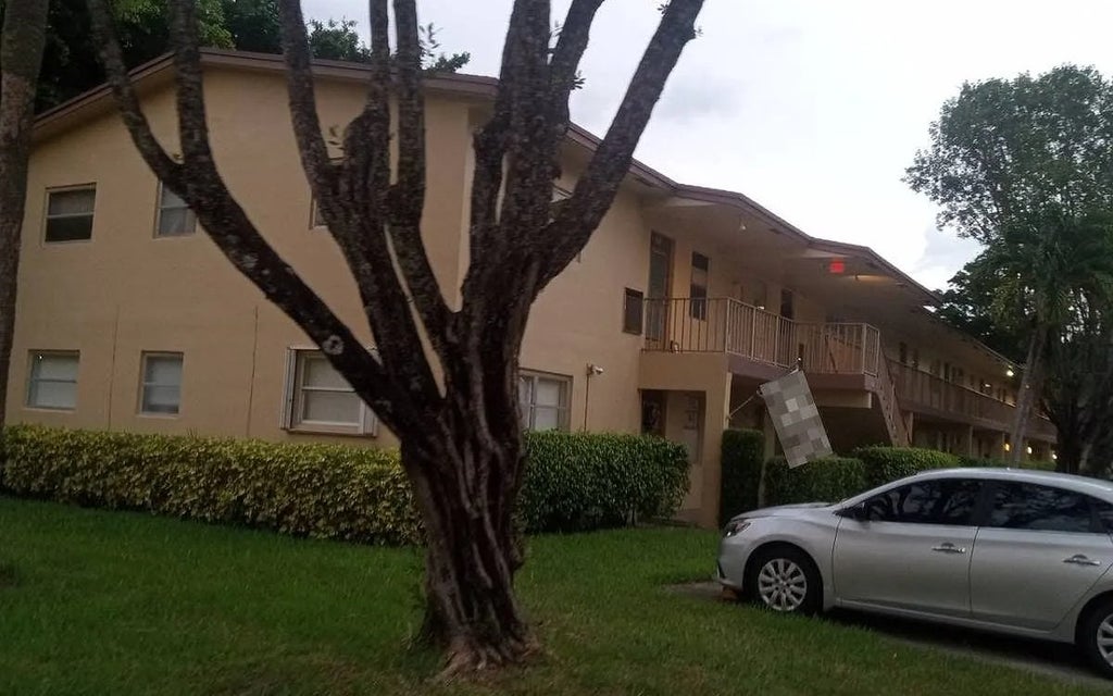 Photo of 7640 NW 1st St Apt 102 ST, Other, FL 33063 (MLS # 133207)
