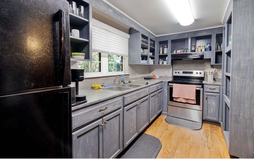 Photo of 313 NW Madison St, Lake City, FL 32055 (MLS # 130692)