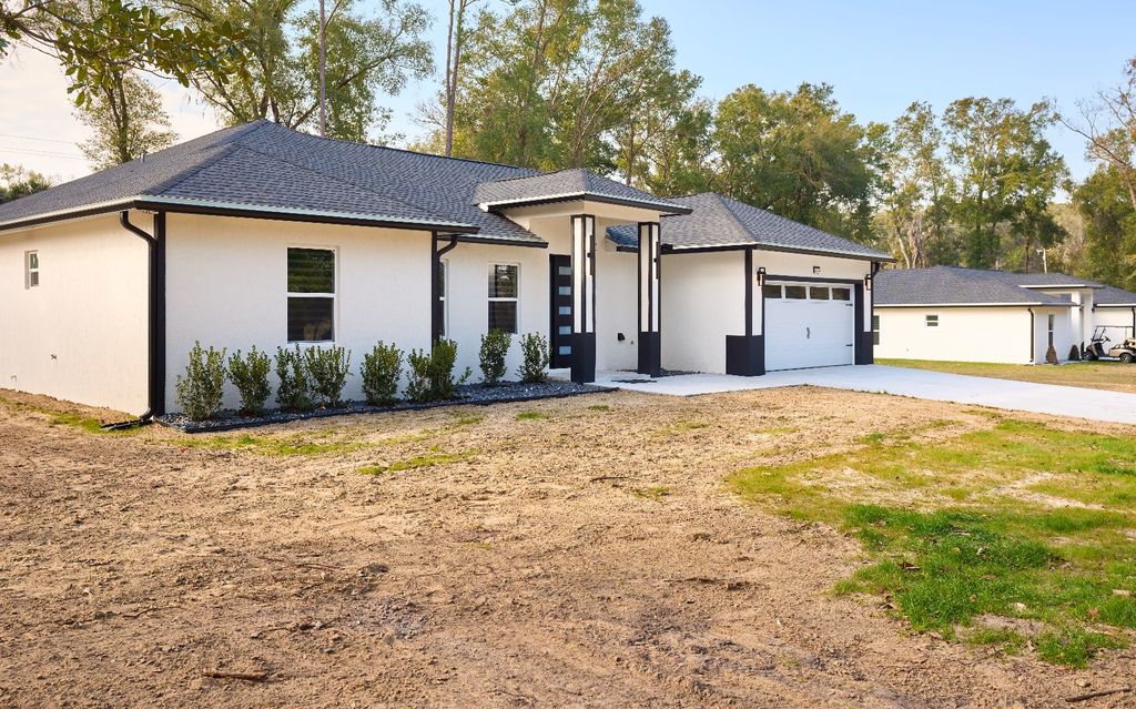 Photo of 894 NW Fairway Dr, Lake City, FL 32055 (MLS # 130083)