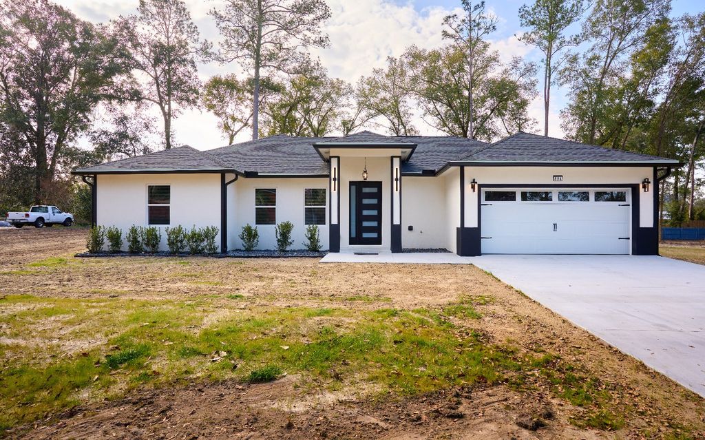 Photo of 894 NW Fairway Dr, Lake City, FL 32055 (MLS # 130083)