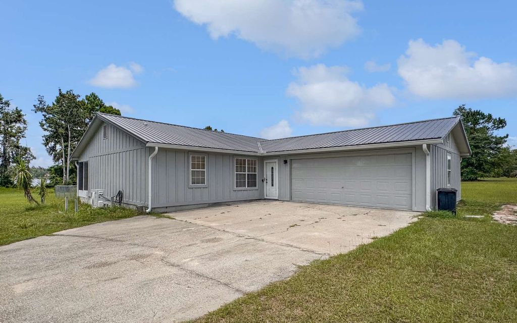 Photo of 6551 NW 31st Circle, Jennings, FL 32053 (MLS # 127389)