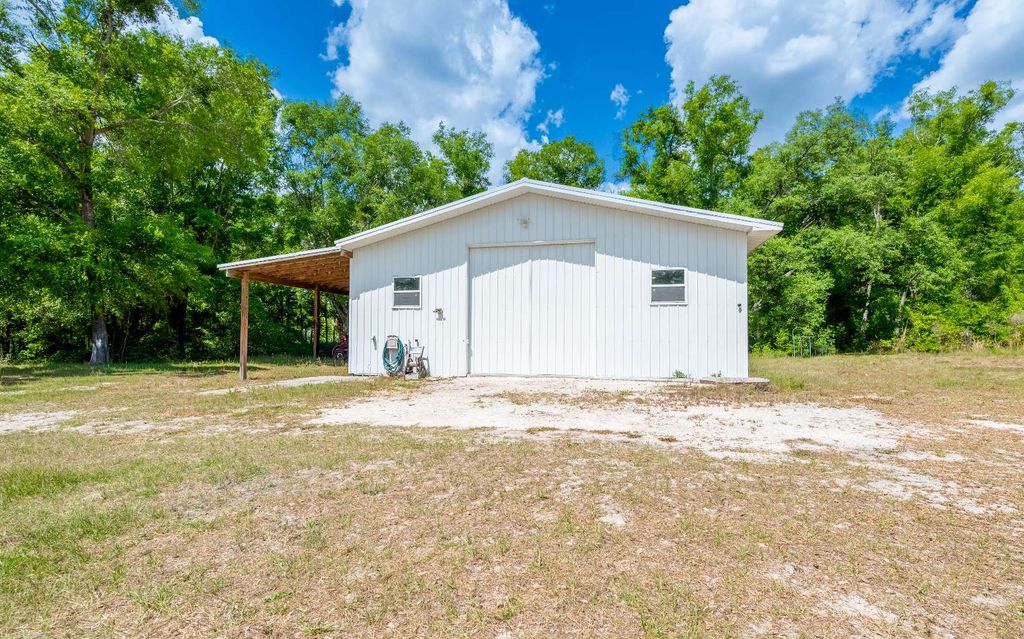 Photo of 15900 158th Terrace, McAlpin, FL 32062 (MLS # 131214)