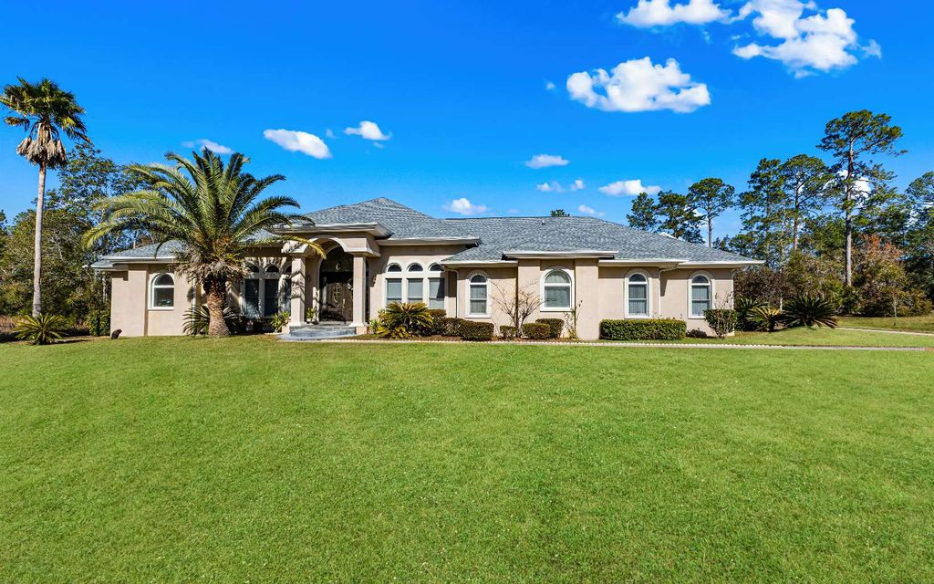 Photo of 421 NW Scenic Lake Dr, Lake City, FL 32055 (MLS # 125645)