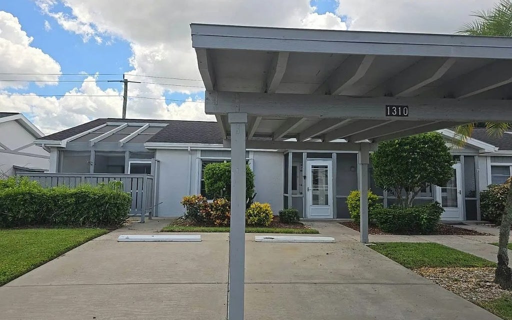 Photo of 1310 Sandtrap Dr, Lee, FL 33919 (MLS # 133562)