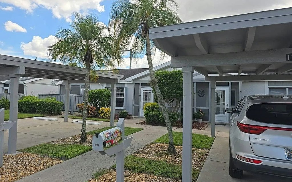 Photo of 1310 Sandtrap Dr, Lee, FL 33919 (MLS # 133562)