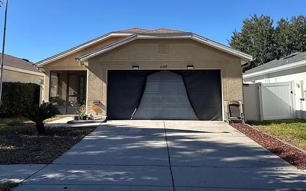 Photo of 11329 Cocoa Beach Dr, Other, FL 33569 (MLS # 129596)