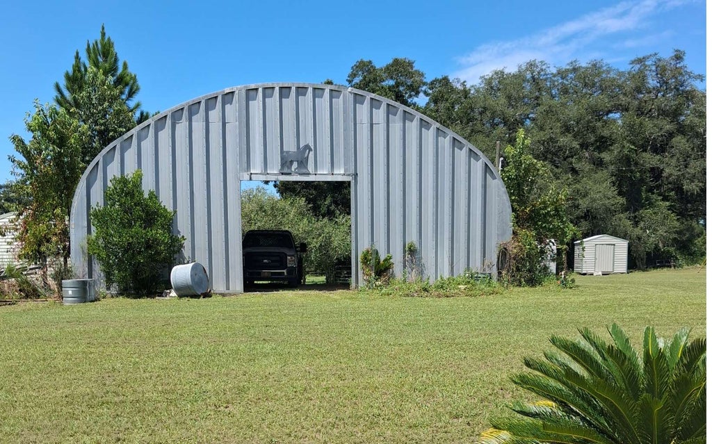Photo of 19649 57th Road, McAlpin, FL 32062 (MLS # 132810)