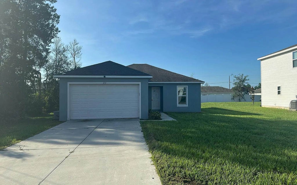 Photo of 214 Hyacinth Ct, Other, FL 34759 (MLS # 133578)