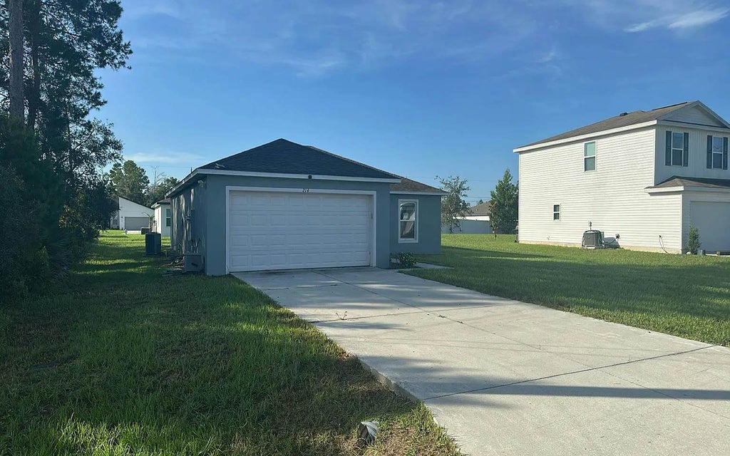 Photo of 214 Hyacinth Ct, Other, FL 34759 (MLS # 133578)